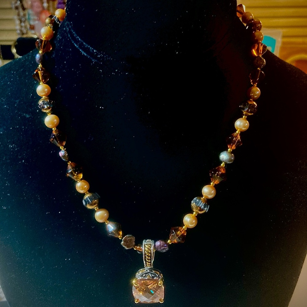 Gold and Brown Necklace with Intricate Pendant